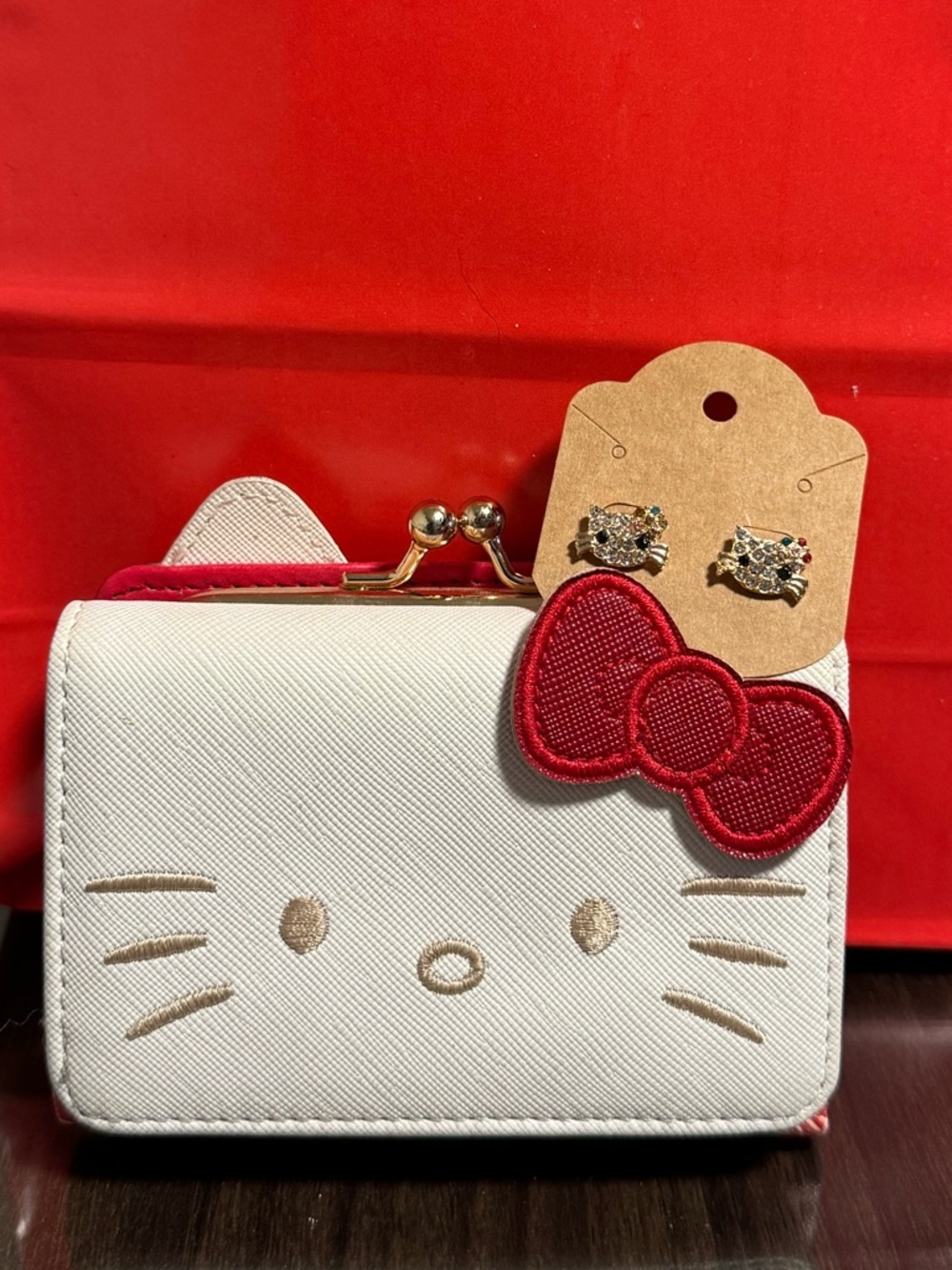 Hello Kitty wallet with rhinestone earrings